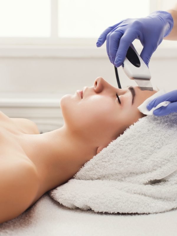 woman-getting-facial-treatment-at-beauty-salon.jpg